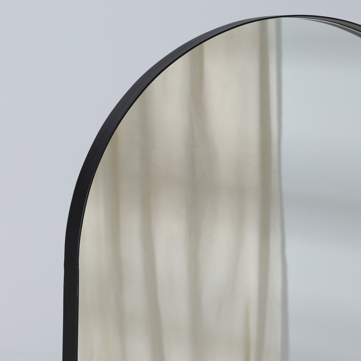 Espejo Migú con marco metálico